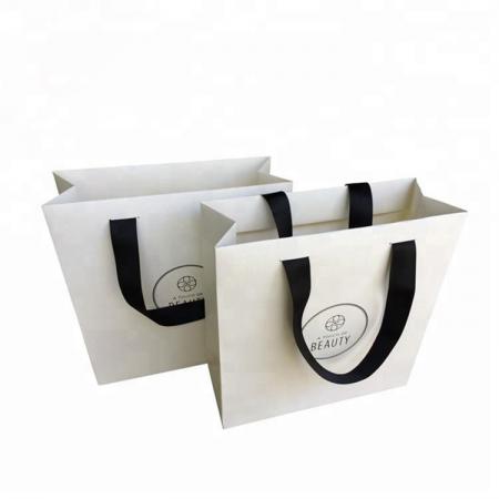 precio competitivo elegante logotipo de marca personalizado boutique de lujo compras bolsas de regalo de papel blanco con asas de cinta