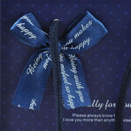 impresión de logotipo personalizado laminado de color azul brillante bolsas de papel de regalo de compras
