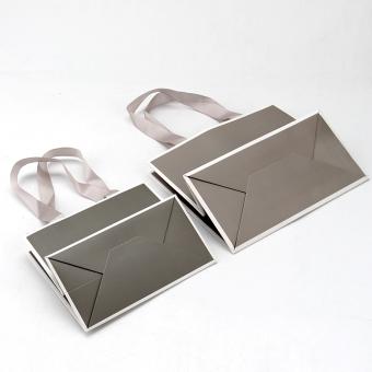 fabricante de bolsas personalizadas bolsas de papel de embalaje de lujo al por menor con su propio logotipo