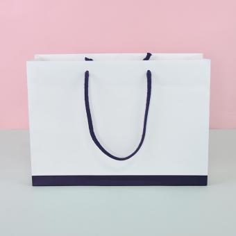 Boutique de lujo de embalaje de papel blanco bolsa de regalo de encargo del logotipo impreso en papel bolsas de la compra con la cuerda del algodón asas